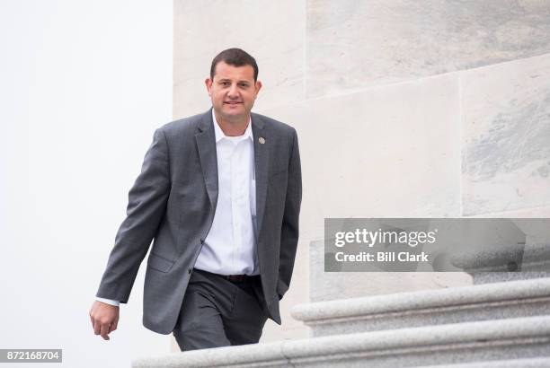 Rep. David Valadao, R-Calif., walks up the House steps for a vote in the Capitol on Thursday, Nov. 9, 2017.