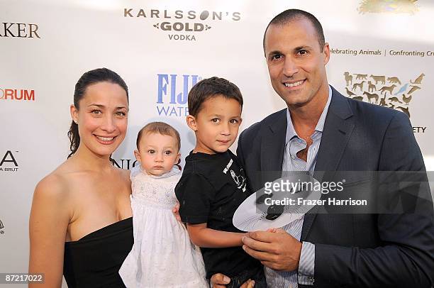 Photographer Nigel Barker and family Christine Barker, Jasmin, and Jack pose at The HSUS "A Sealed Fate?" Photography Exhibition on May 13, 2009 at...