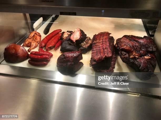 texas ribs and brisket and sausage and ham - fried okra stock pictures, royalty-free photos & images