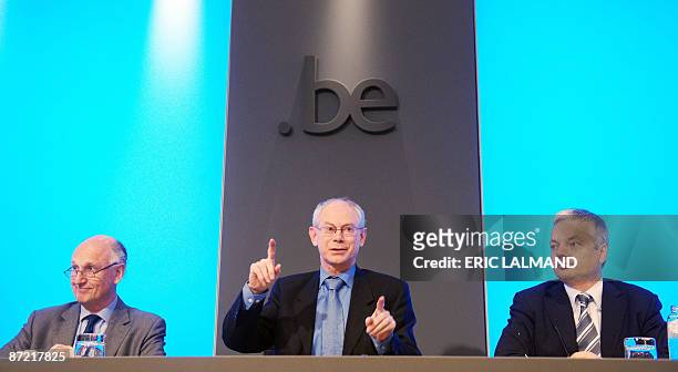 Bank chairman Jan Huyghebaert, Prime Minister Herman Van Rompuy and Finance Minister Didier Reynders give a press conference about the government's...