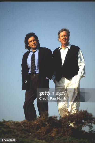English writers and movie producers Ian Le Frenais and Dick Clement walk of Mulholland Highway with downtown Los Angeles in the back ground on March...