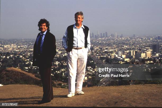 English writers and movie producers Ian Le Frenais and Dick Clement walk of Mulholland Highway with downtown Los Angeles in the back ground on March...