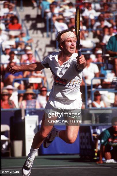 John McEnroe plays in one of his last professional tournaments before he retired from the ATP circuit at Indian Wells April 9, 1991 at Indian Wells...