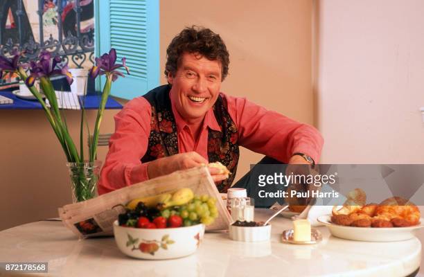 Michael Crawford in his Hollywood apartment eating a breakfast of fruit and pastries August 9, 1991 Hollywood, Los Angeles, California