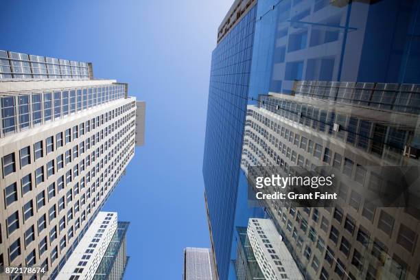 office towers downtown on sunny day. - sydney cbd stock pictures, royalty-free photos & images