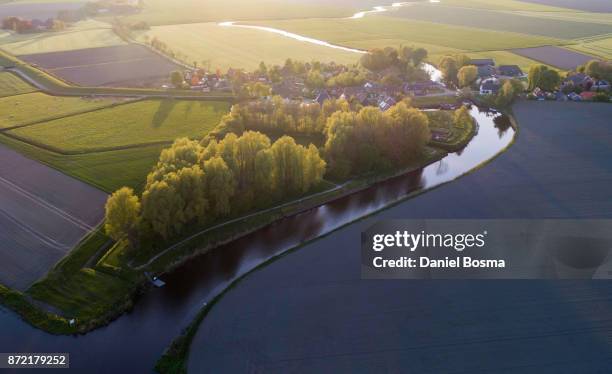 schouwerzijl during sunset seen from above - sombra paralela fotografías e imágenes de stock