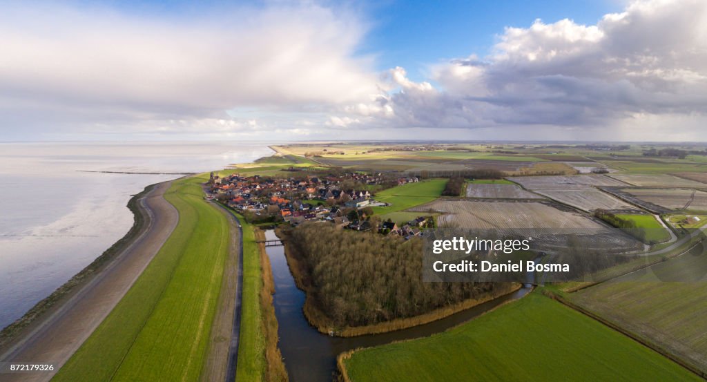 Aerial photo of a historical village called Wierum and its hinterland