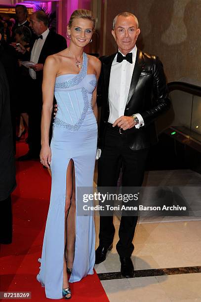 Model Sarah Marshall and designer Jean-Claude Jitrois attend the Chopard Hosts Belle De Nuit Party at the Hotel du Cap during the 62nd Annual Cannes...