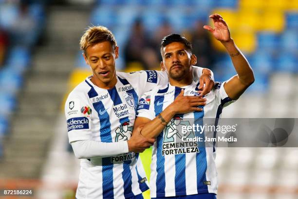 Keisuke Honda and Franco Jara of Pachuca celebrate their team's first goal during the quarter final match between Pachuca and Tijuana as part of the...