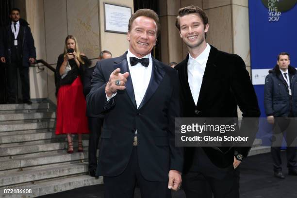 Arnold Schwarzenegger and his son Patrick Schwarzenegger arrive for the GQ Men of the year Award 2017 at Komische Oper on November 9, 2017 in Berlin,...