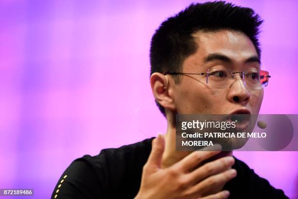 Bike-sharing start-up Ofo's co-founder and chief operating officer Zhang Yanqi gives an interview during the 2017 Web Summit in Lisbon on November 9,...