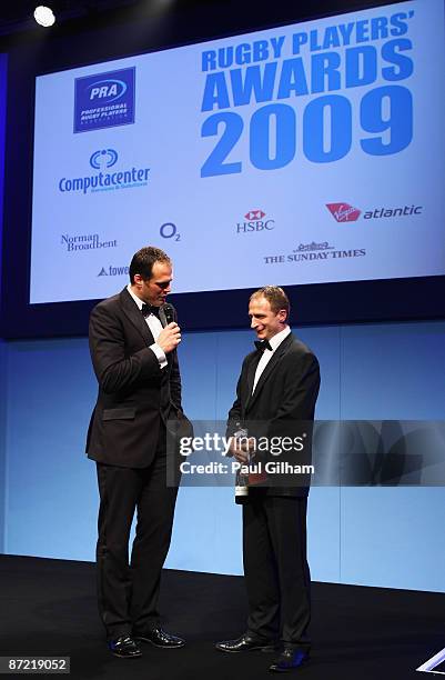 Martin Bayfield talks to Mike Catt after he was presented with the O2 Special Merit Award by Steve Borthwick and Mark Stevenson during the PRA Rugby...