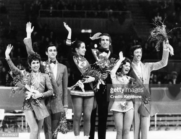 Winners of the ice dancing competition, Angelika Buck and her brother Erich Buck of Germany, on the podium at the European Figure Skating...