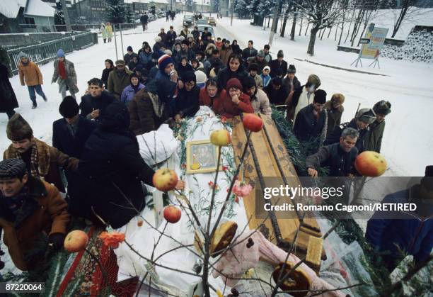 The funeral of a revolutionary in Garbova, Romania, during the Romanian Revolution, December 1989.