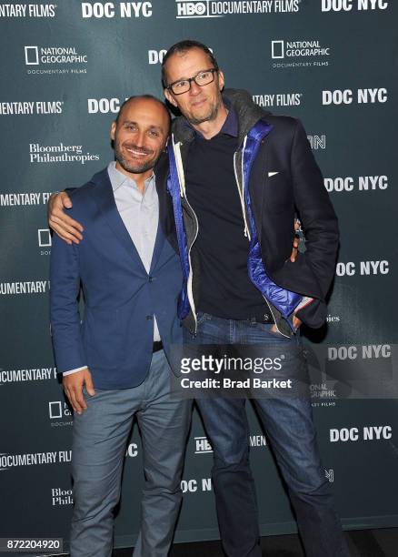 Amir Bar-Lev and John Battsek attend the 4th Annual DOC NYC Visionaries Tribute Luncheon at The Edison Ballroom on November 9, 2017 in New York City.