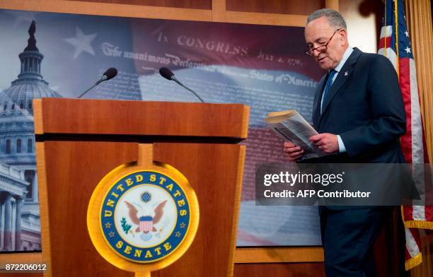 Senate Minority Leader Chuck Schumer, Democrat of New York, arrives to speak about the Republican Senate tax reform bill during a press conference on...