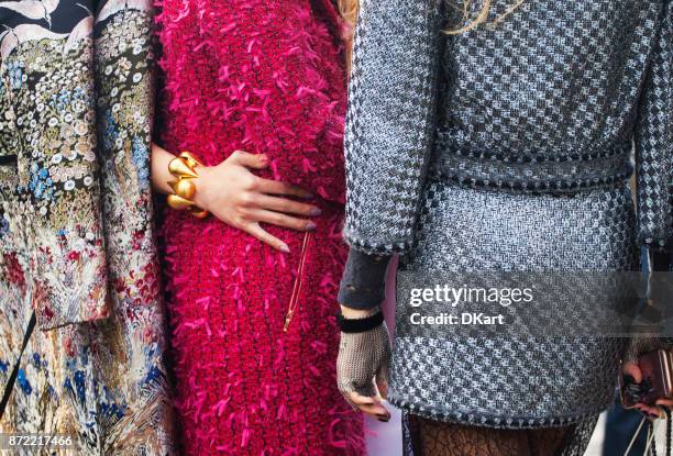 details of womens clothes and shoes on a street - street style paris haute couture 2017 stock pictures, royalty-free photos & images