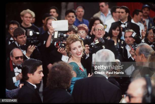 English actress Emma Thompson arrives at the 1993 Oscar awards March 29, 1993 Dorothy Chandler Pavilion, Los Angeles, California