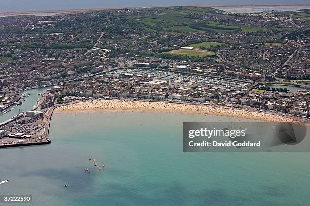 North of the Isle of Portland and on the south coast is the seaside resort of Weymouth. On 2nd June 2006.