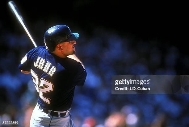 John Jaha of the Milwaukee Brewers swings at the ball during a game against the Anaheim Angels circa 1990's at Anaheim Stadium in Anaheim, California.