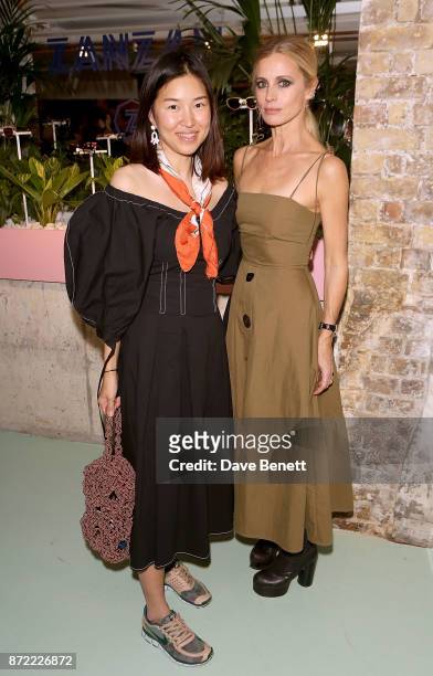 Rejina Pyo and Laura Bailey attend a cocktail party hosted by eyewear brand Zanzan at Alex Eagle on November 9, 2017 in London, England.