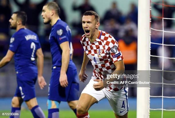 Croatia's midfielder Ivan Perisic celebrates after soring a goal during the WC 2018 play-off football qualification match between Croatia and Greece...