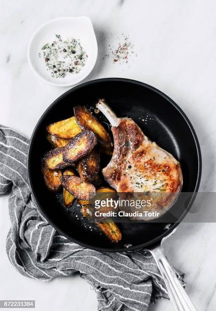 roasted pork chops with potatoes - fingerling potato stock pictures, royalty-free photos & images