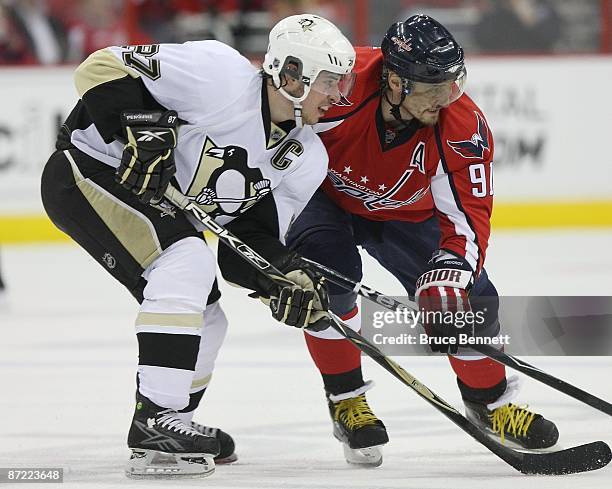 Sergei Fedorov of the Washington Capitals skates against Sidney Crosby of the Pittsburgh Penguins during Game Seven of the Eastern Conference...