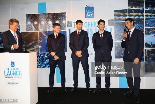 David Goffin of Belgium, Grigor Dimitrov of Bulgaria, Dominic Thiem of Austria and Rafael Nadal of Spain talk with Andrew Castle during the The...