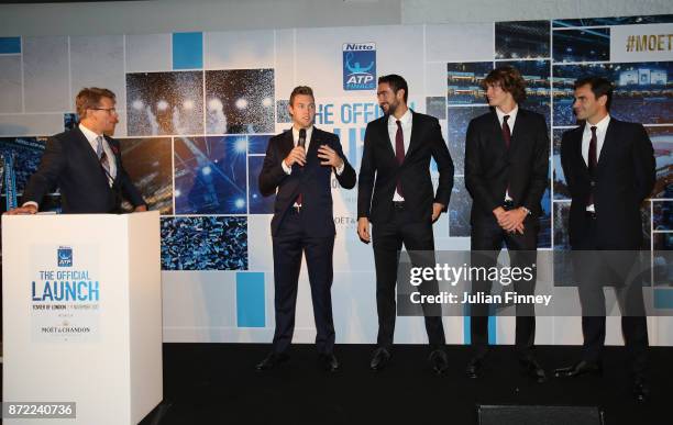 Jack Sock of USA, Marin Cilic of Croatia, Alexander Zverev of Germany and Roger Federer of Switzerland speak with Andrew Castle during the The...