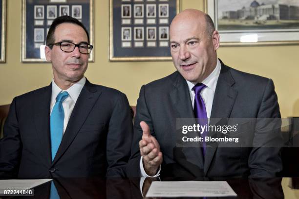 Gary Cohn, director of the U.S. National Economic Council, right, speaks as Steven Mnuchin, U.S. Treasury secretary, listens during a meeting with...