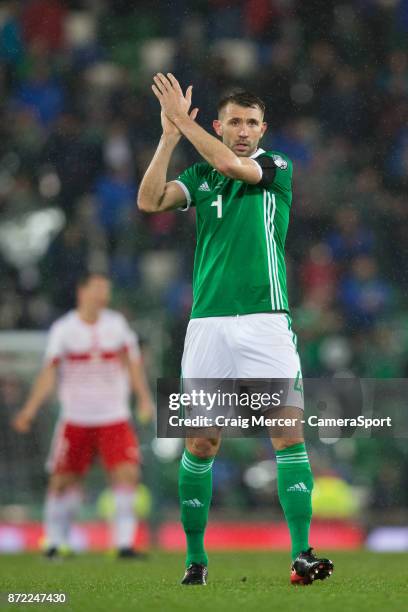Northern Irelands Gareth McAuley applauds the fans at the final whistle during the FIFA 2018 World Cup Qualifier Play-Off: First Leg between Northern...