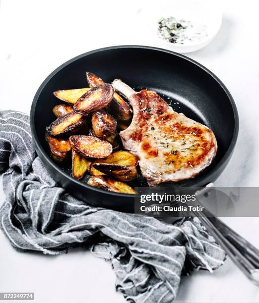 roasted pork chops with potatoes - fingerling potato stock pictures, royalty-free photos & images