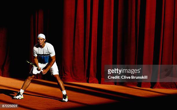 Rafael Nadal of Spain ready to receive a serve during a practice session during the Madrid Open tennis tournament at the Caja Magica on May 14, 2009...