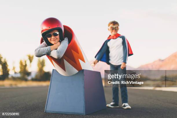 young stunt girl and human cannon ball - human cannon ball stock pictures, royalty-free photos & images