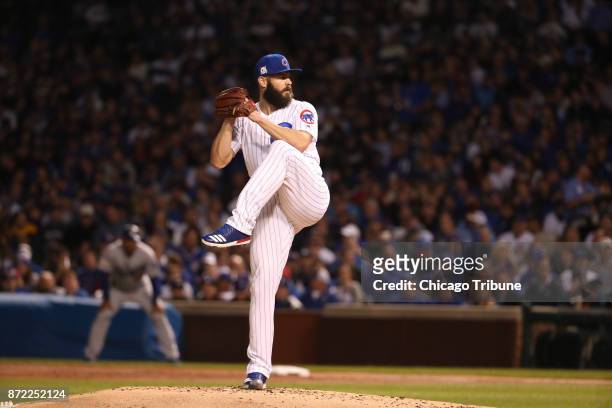 Chicago Cubs starting pitcher Jake Arrieta works against the Los Angeles Dodgers in the first inning during Game 4 of the National League...
