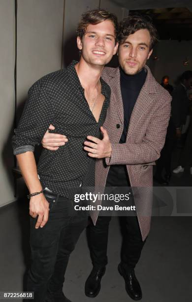 Jeremy Irvine and Tom Hughes attend the launch of the MR PORTER own label, Mr P, on November 9, 2017 in London, England.