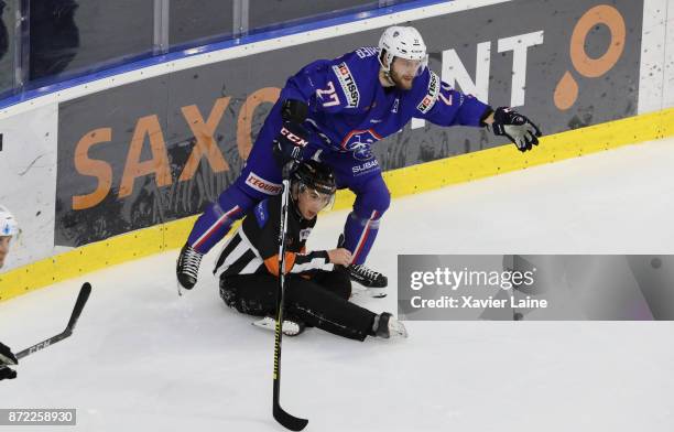 Loic Lamperier of France slash the referee during the EIHF Ice Hockey Four Nations tournament match between France and Slovenia at Aren'ice on...