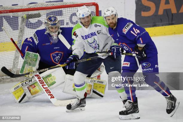 Ronan Quemener of France in action with Stephane Da Costa during the EIHF Ice Hockey Four Nations tournament match between France and Slovenia at...