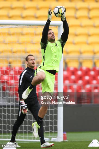 Stefan Marinovic takes part in a drill while Glen Moss looks on during a New Zealand All Whites training session at Westpac Stadium on November 10,...