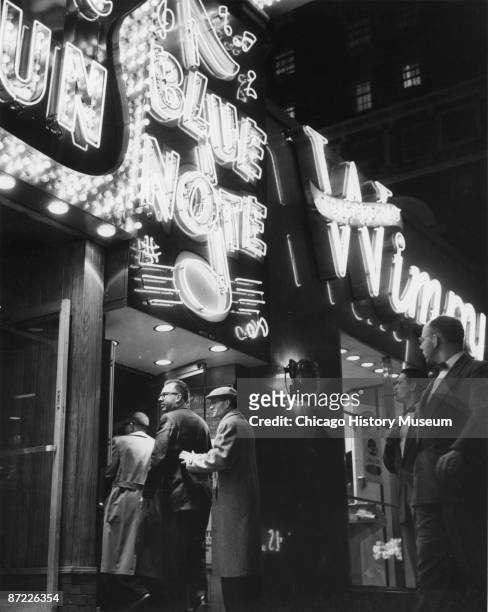 Jazz fans enter the Blue Note Cafe under its bright marquee, Chicago, 1955.