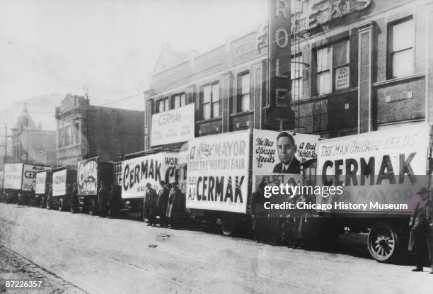 Campaign trucks for Anton Cermak are visible in Chicago's Twenty-second ward, 1931.