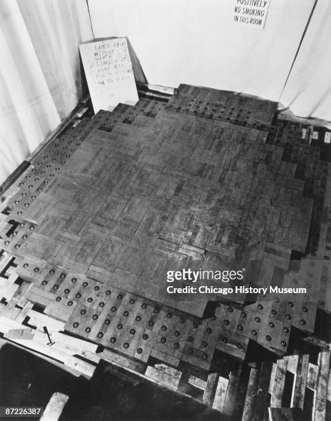 View of the world's first nuclear pile taken during its construction shows dozens of uranium pellets embedded in graphite blocks, Chicago, November...