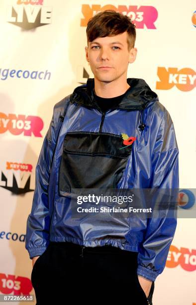 Louis Tomlinson poses at Key 103 Live at Manchester Arena on November 9, 2017 in Manchester, England.