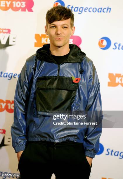 Louis Tomlinson poses at Key 103 Live at Manchester Arena on November 9, 2017 in Manchester, England.