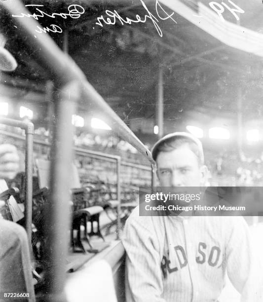 Informal three-quarter length portrait of Hall of Fame outfielder Tris Speaker of the American League's Boston Red Sox, sitting in front of...