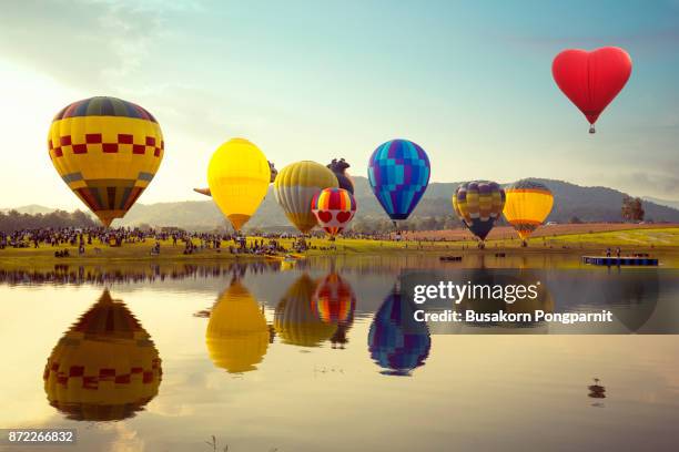 balloon festival, landscape view and sunset. - hot air balloon festival stock pictures, royalty-free photos & images