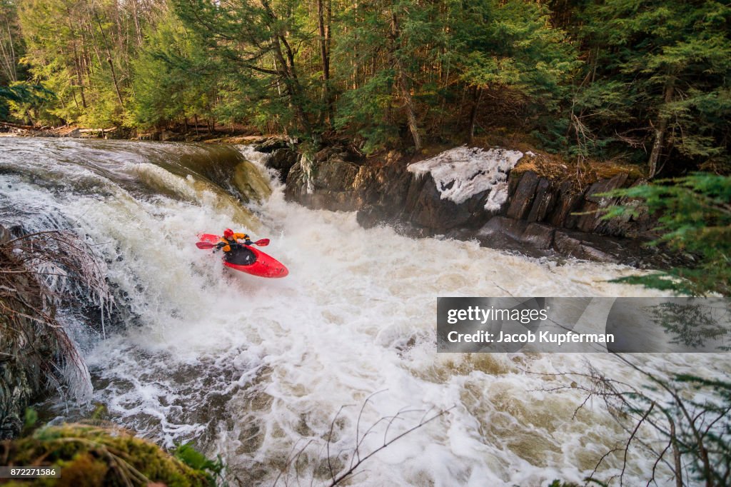 Whitewater Kayaking on a River in the Spring