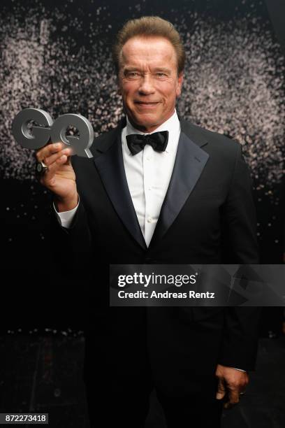 Legend of the Century" GQ Man of the year Arnold Schwarzenegger poses backstage at the GQ Men of the year Award 2017 at Komische Oper on November 9,...