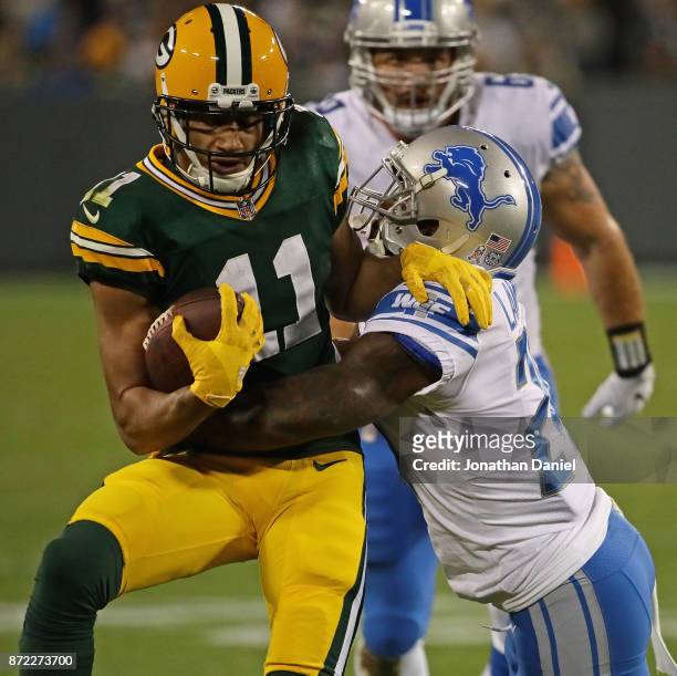 Nevin Lawson of the Detroit Lions tackles Trevor Davis of the Green Bay Packers at Lambeau Field on September 28, 2017 in Green Bay, Wisconsin. The...